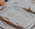 Plate with wedding menu on it